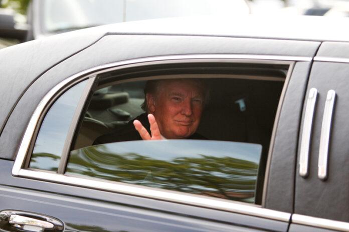 Donald Trump, president, limousine, motorcade, vehicle, waving, gesture