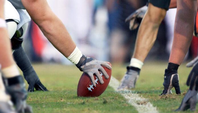 football, center, snap, line of scrimmage, offensive line, football game, sports action, gridiron