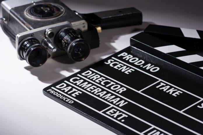 film production, clapperboard, slate, vintage camera, movie making, film equipment, cinematography, director