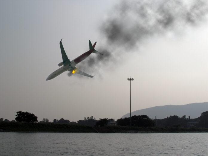 plane crash, aircraft accident, crash site, smoke, fire, emergency, aviation disaster, wreckage