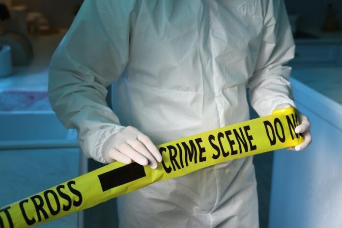 Missing Woman is Found: Dead in Suitcase (crime scene tapedreamstime_s_425845022)