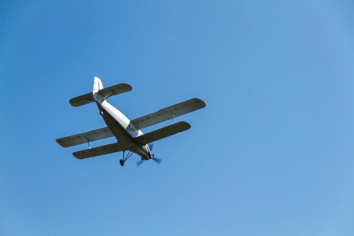 Vintage Biplane in Flight